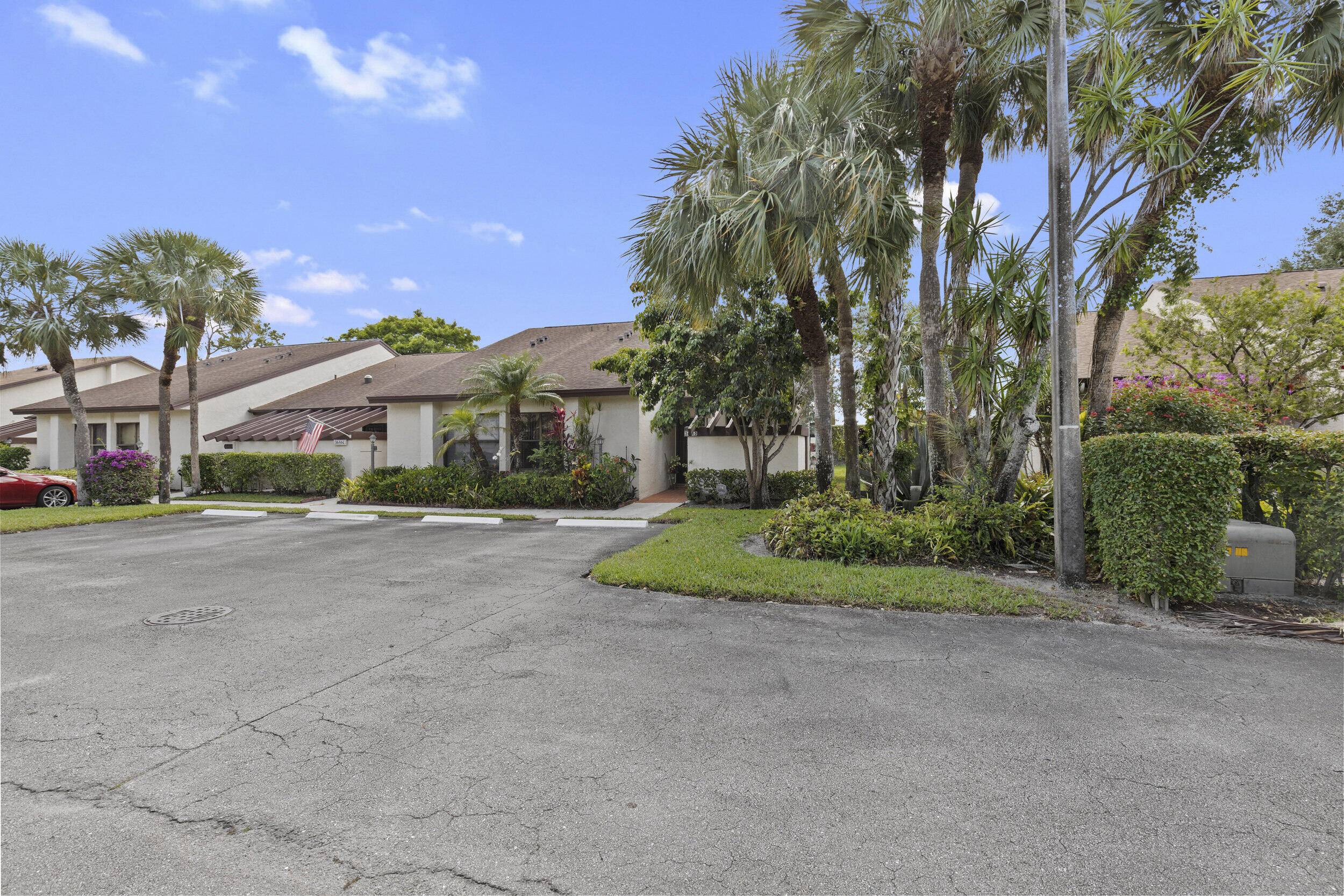 Welcome to this beautifully maintained 2 bedroom, 2 bath corner villa in the heart of the highly desirable 55 community of Willow Bend !