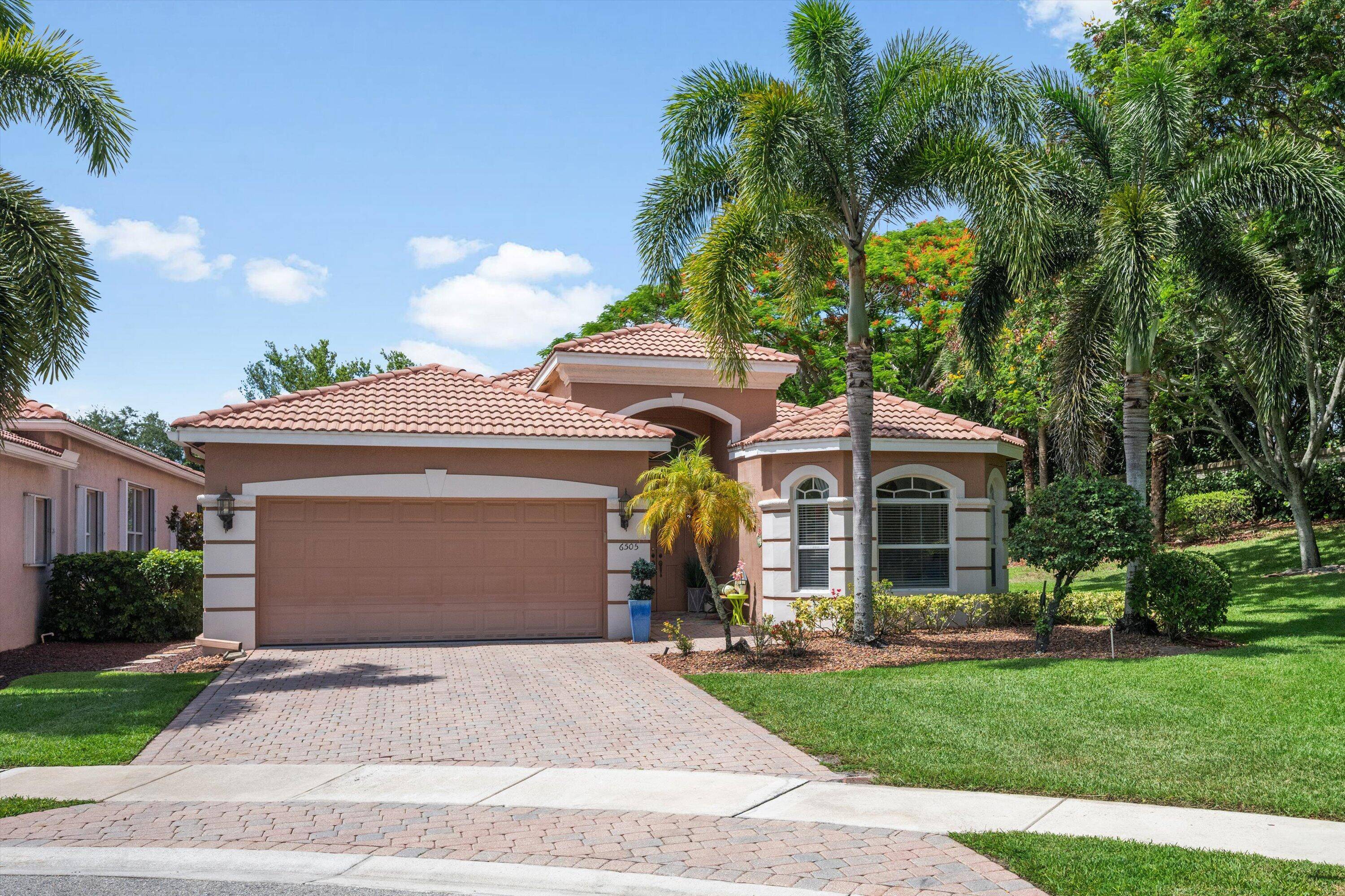 Welcome to this beautifully maintained 3 bedroom, 2 bath home located on an oversized corner lot in the highly desirable 55 community of Villaggio.