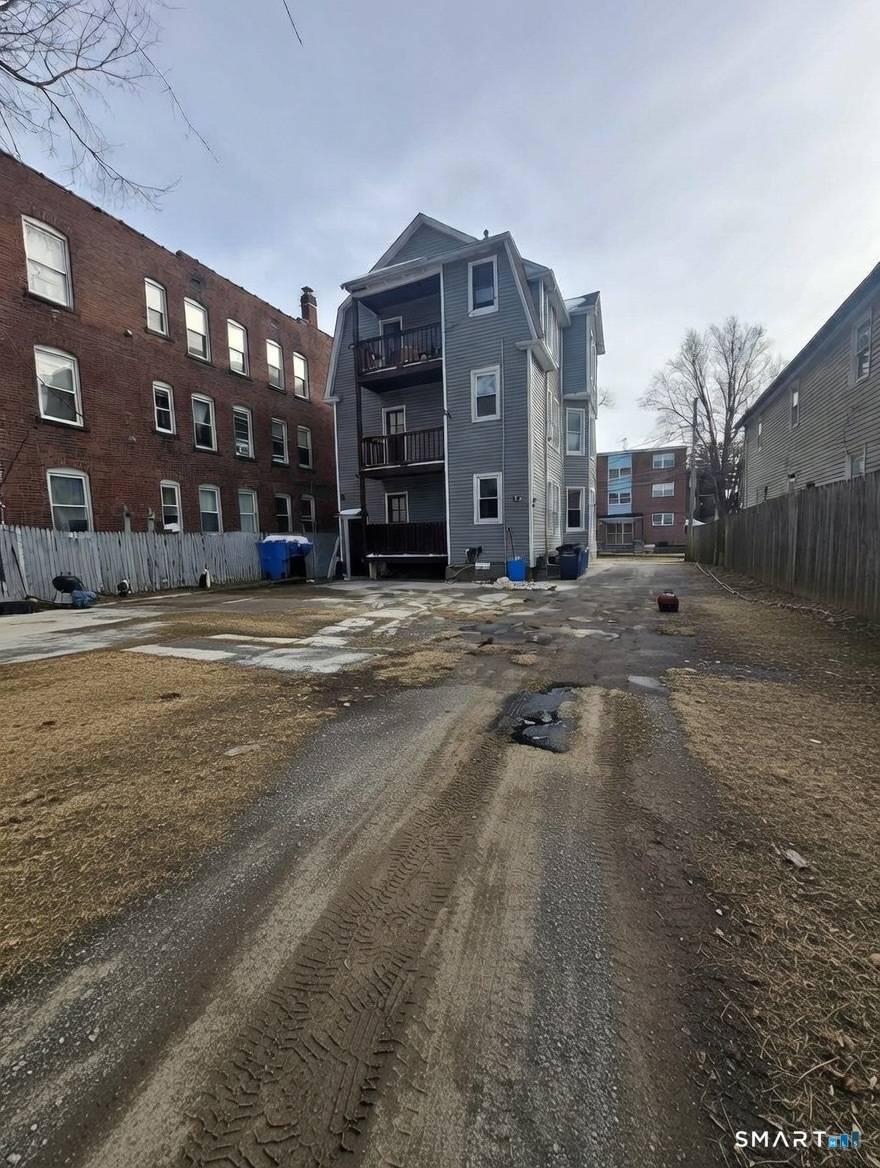 Excellent opportunity to own a fully renovated three unit multifamily ideal for FHA owner occupants or investors.