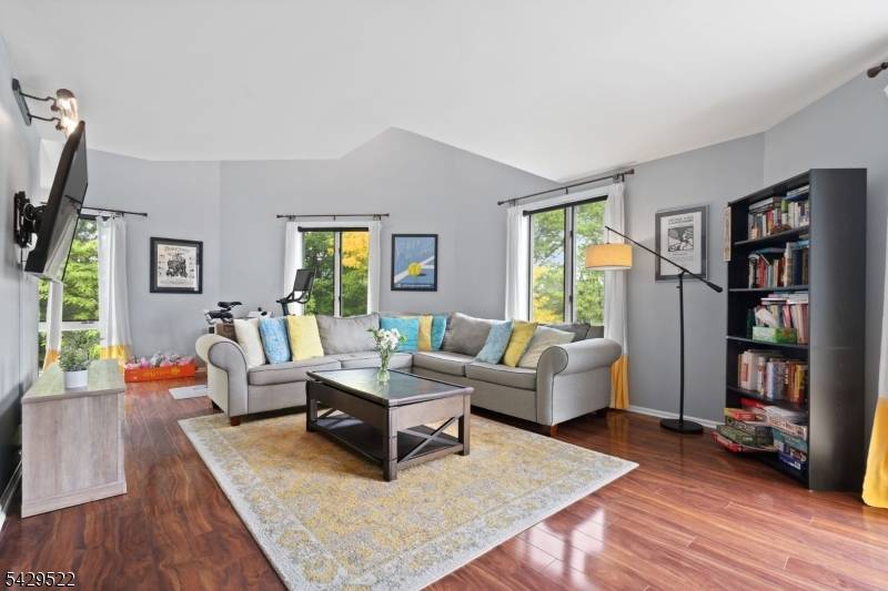 Rare opportunity to own a one of a kind penthouse style townhouse at The Mews in the heart of Montclair.