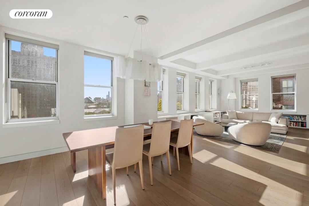 Tribeca loft proportions meet full service amenities in this sun drenched three bedroom, two bathroom condominium featuring an expansive open plan layout, sleek modern finishes, and breathtaking City Hall views ...