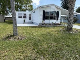 Welcome to your new home in a peaceful 55 community, sitting on a pet lot with a lovely backyard and plenty of outdoor space for you and your furry friend ...