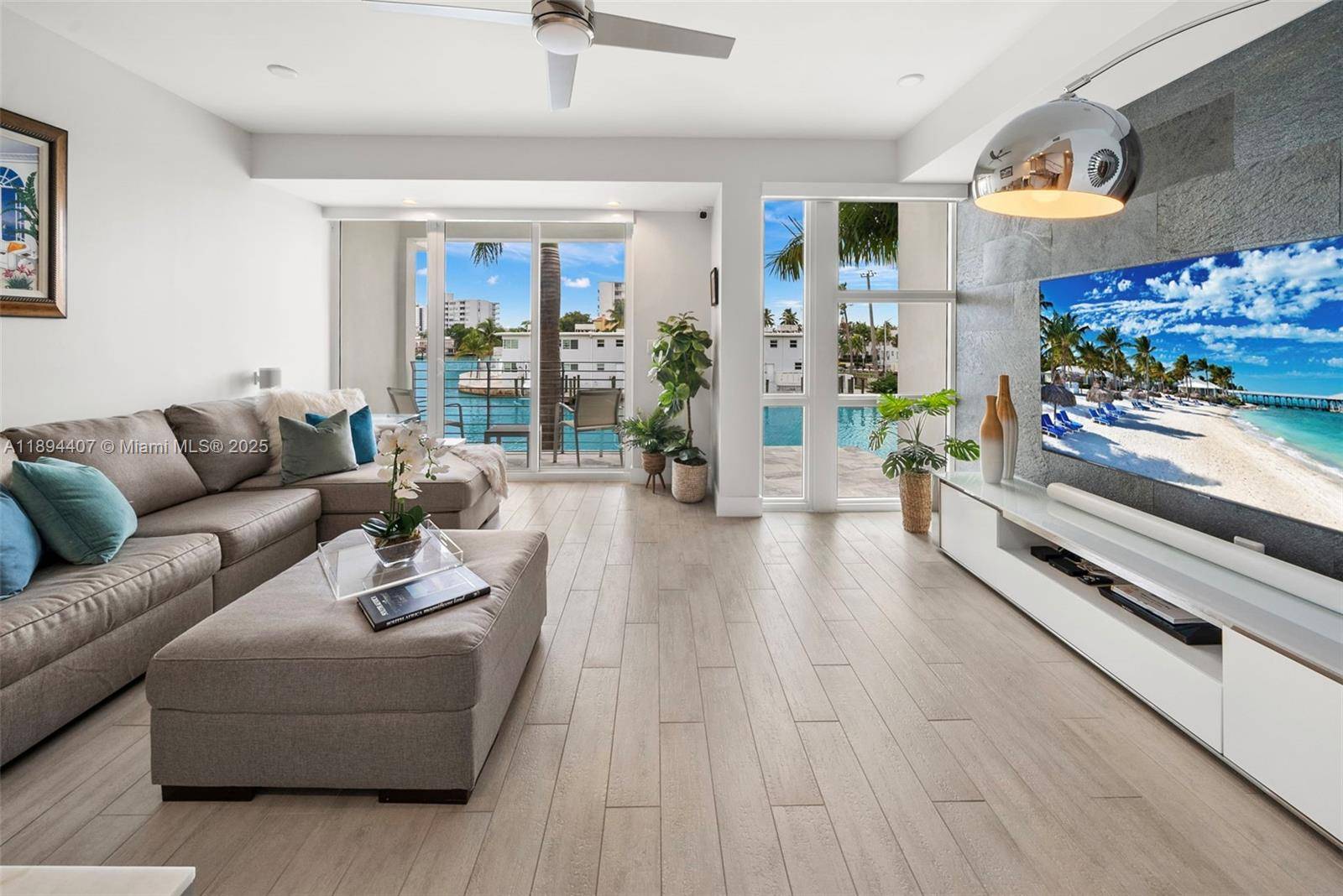 Stunning 4 story waterfront townhome with private dock in Iris on the Bay, Miami Beach.