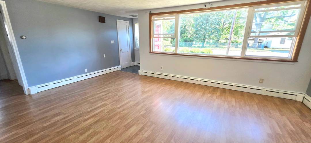 This charming two bedroom ranch style home is ideally situated in a highly desirable area of Milford.