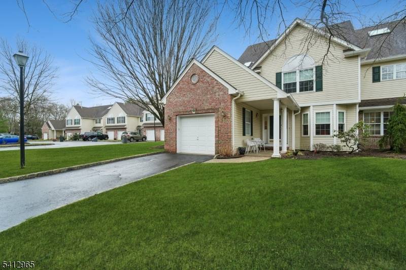 This north facing end unit builder's model offers almost 2500 sq ft of beautifully updated living across three levels.