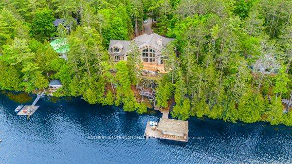 Welcome to Vista Ridge Residence an extraordinary lakeside retreat on Crystal Lakewhere warmth and charm meets modern luxury.