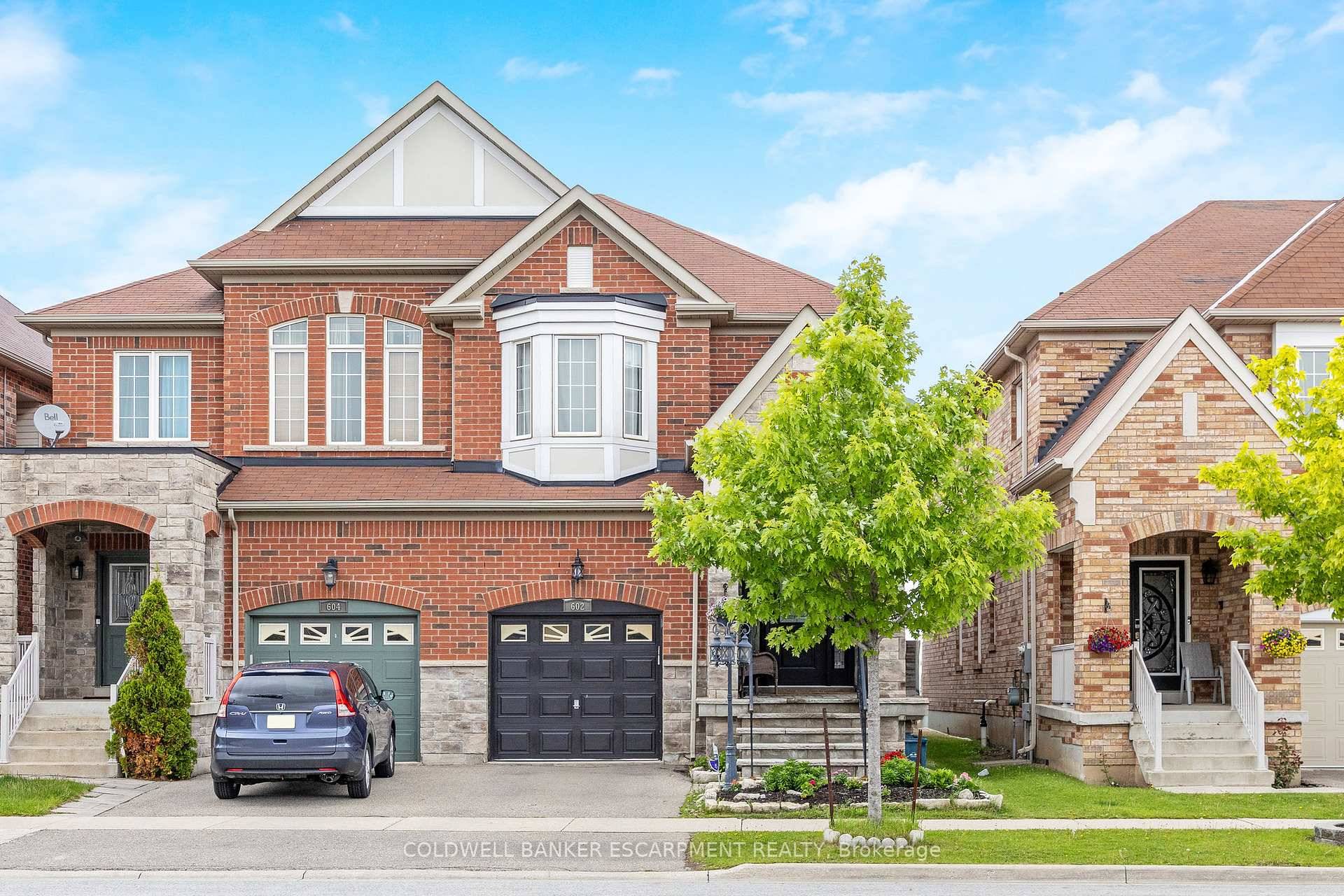 Welcome to 602 Yates Drive, Milton An Executive Semi Detached Home That Truly Has It All !