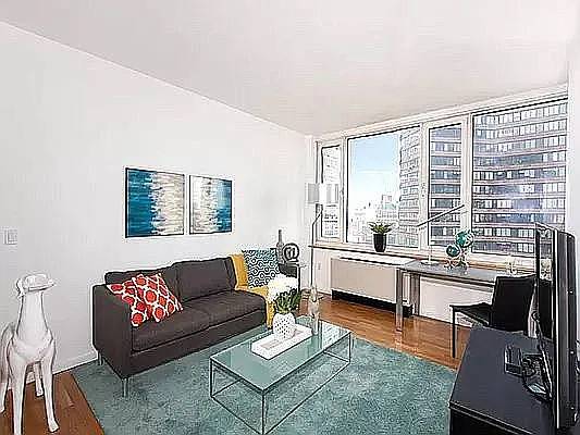 Flooded with sunlight, this stunning south facing 1BR condo is in excellent condition and features an ideal floor plan with city and partial Hudson River views.