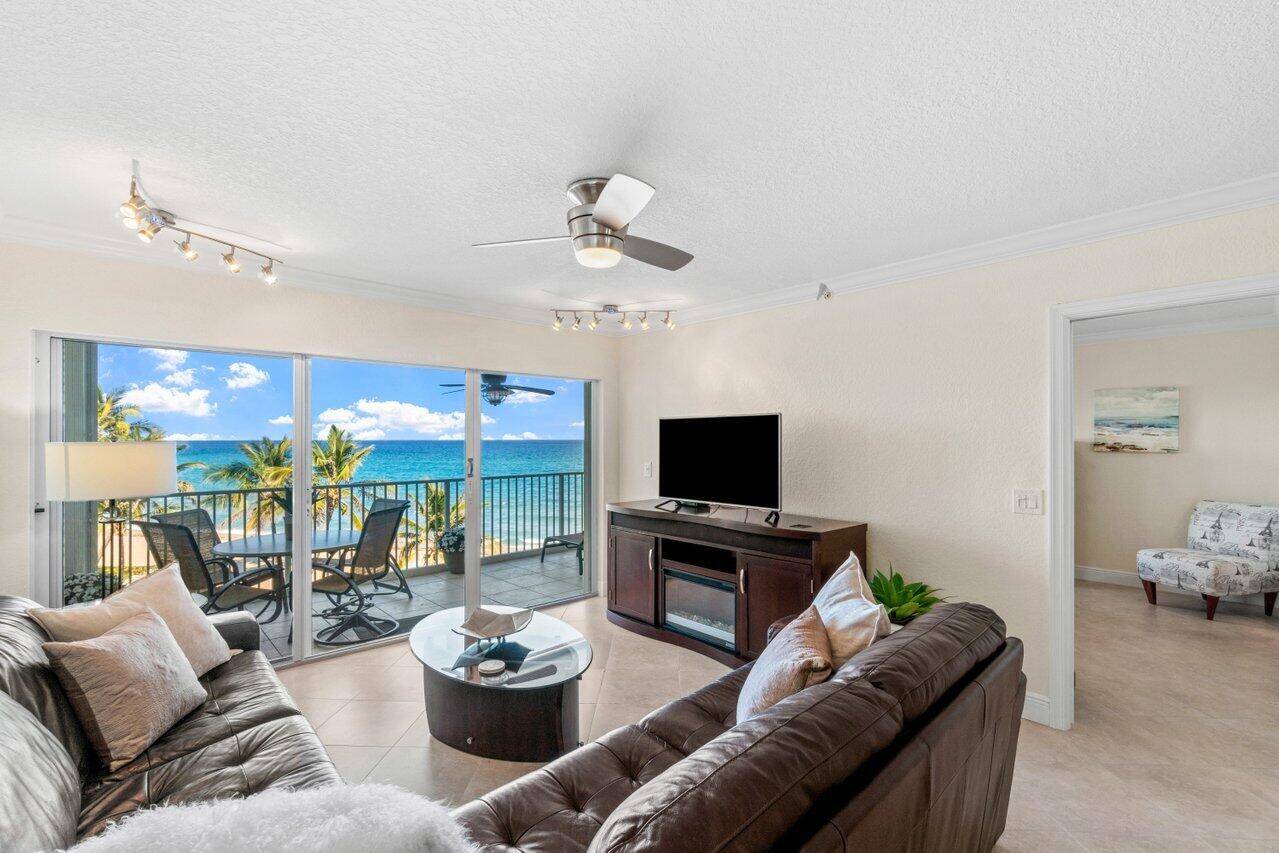 NO SPECIAL ASSESSMENTS ! COME LIVE IN THIS POSTCARD PERFECT VIEW, BURY YOUR TOES IN THE SAND, CATCH SOME RAYS SWIM IN THE TURQUOISE OCEAN !