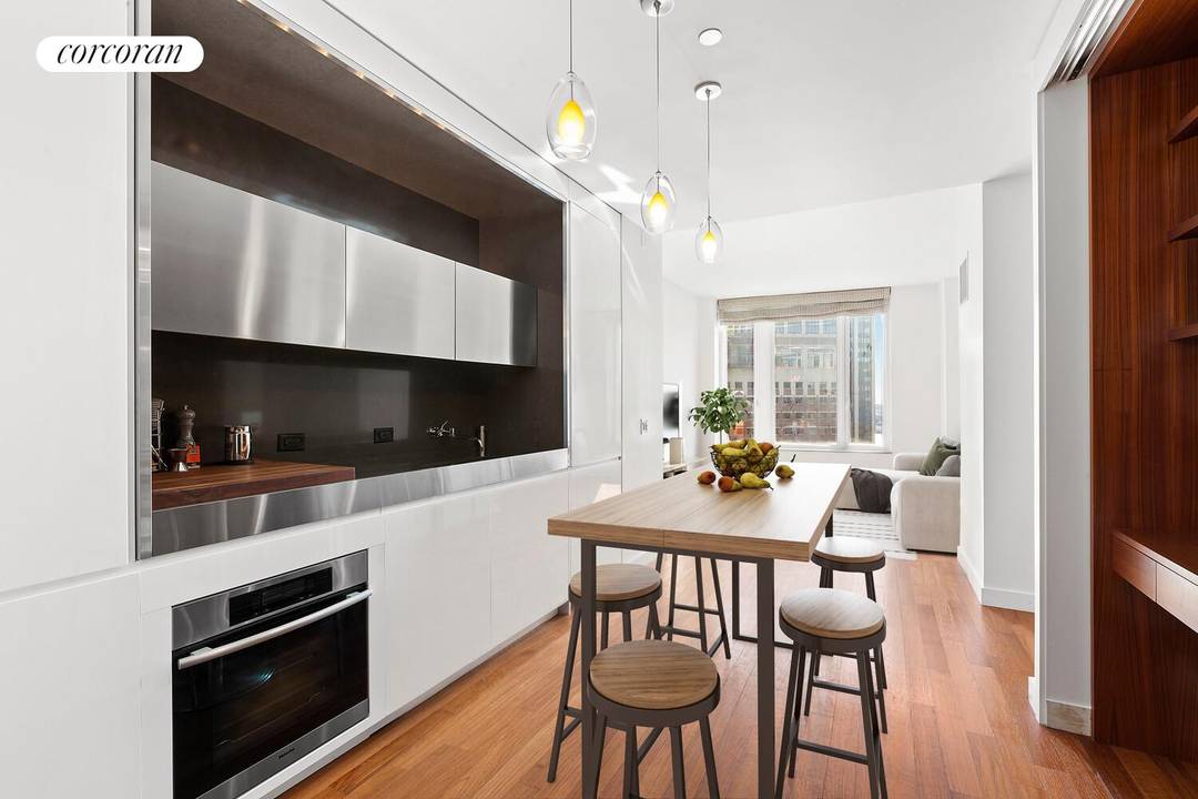 This modern and sophisticated one bedroom, one bathroom residence offers approximately 832 square feet of thoughtfully designed living space with soaring high ceilings and oversized double glazed windows showcasing open ...