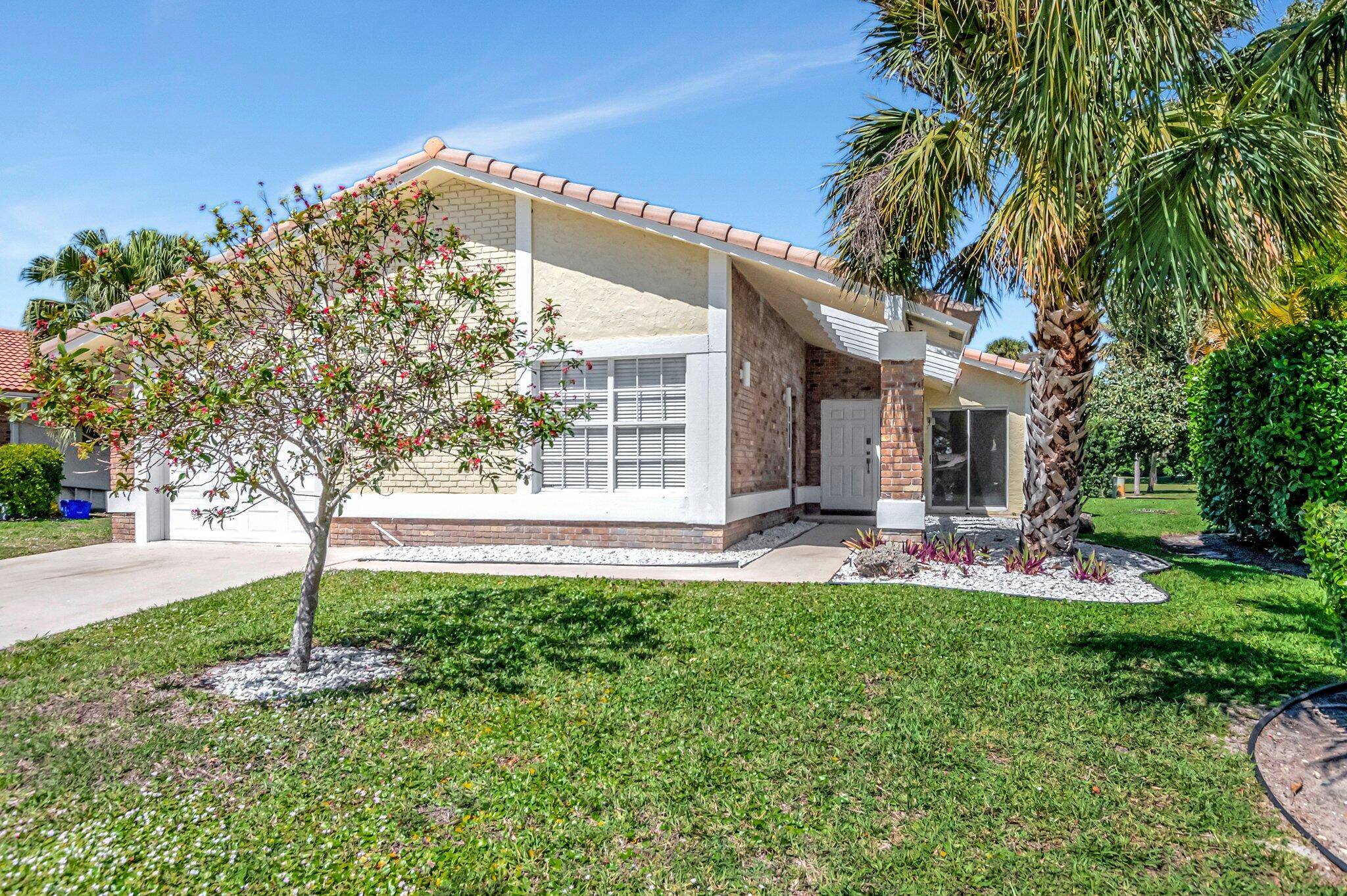 Immaculate 3BR 2BA home in the highly sought after Boca Greens manned gated golf community with no mandatory membership fees.