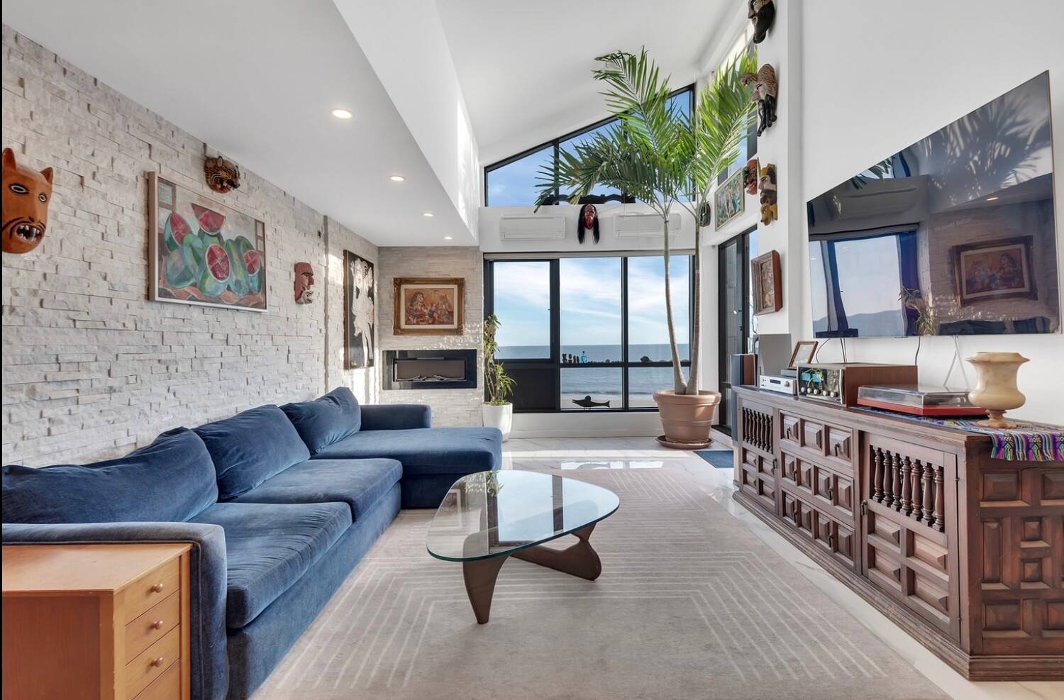 Perched distinctly upon the penthouse floor, endless panoramic views of sand and sea of the Atlantic Ocean through vaulted atrium windows welcome you warmly to one of the most stunningly ...