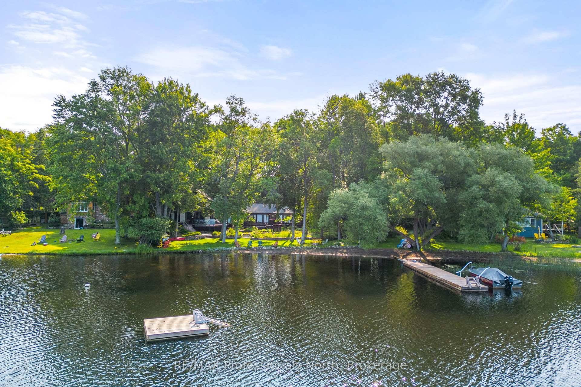 Executive 3 1 bedroom 4 Bathroom Lake house with western exposure for sunsets all year long.