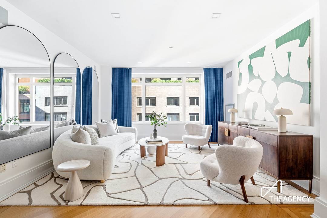 Presenting a refined two bedroom, two bathroom residence in the sought after Harrison Condominium, designed by Robert A.