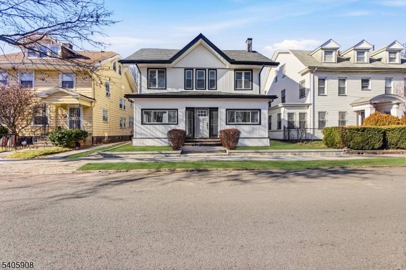 Welcome to 41 Girard Pl, a beautifully renovated Colonial offering generous living space, modern updates, and a functional multi level layout in Newark.