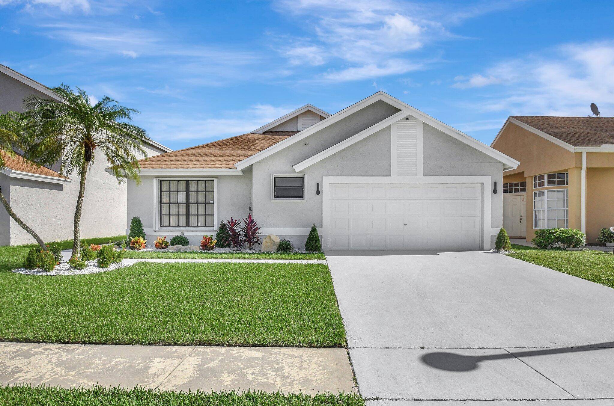 Discover an incredible deal with this charming 3 bedroom, 2 bathroom home plus a versatile den garage converted located in a sought after Boca Raton community with a low HOA ...