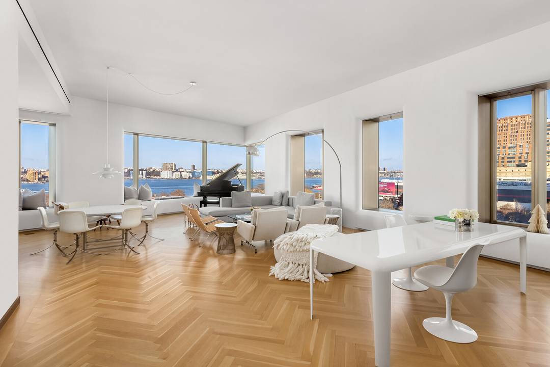 As you step into residence 7A, an elegant foyer sets the tone for a grand lifestyle, creating a refined ambiance.