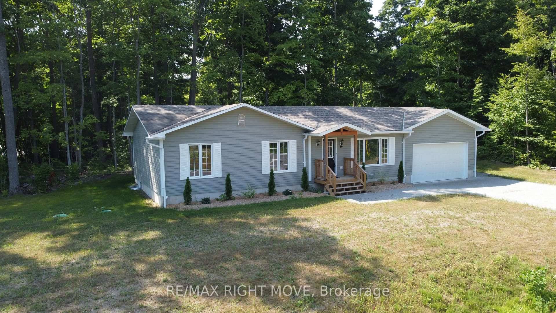 This beautifully remodelled 3 bedroom bungalow offers modern comfort in a peaceful lakeside setting.