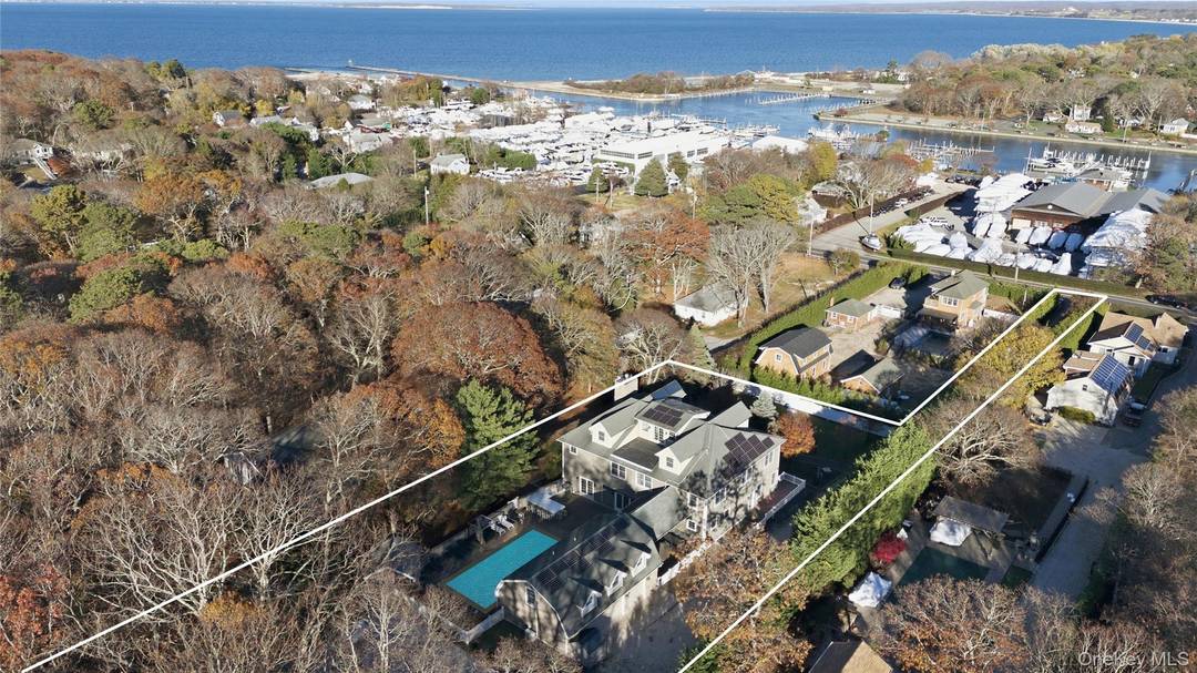 This Residence is perhaps THE LARGEST non waterfront property in Hampton Bays !