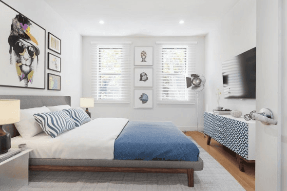 OUR OPINION This renovated apartment features recessed lighting, tall ceilings, up to date finishes, a modern kitchen and skylights.