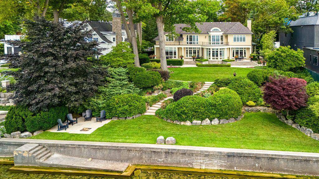 This exquisite French chateau style estate, designed by Gren Weis, is gracefully positioned on a prestigious waterfront parcel with coveted riparian rights, in one of South East Oakville's most sought ...