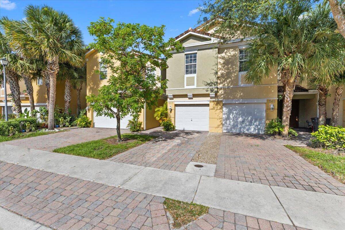 Look no further than this beautifully renovated townhome that is the epitome of modern comfort and style !