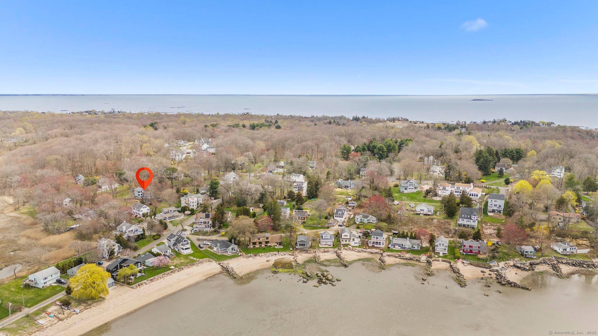 35 Bayberry Lane a stunning, newly rebuilt coastal retreat nestled in the highly sought after Old Sachem Beach neighborhood.