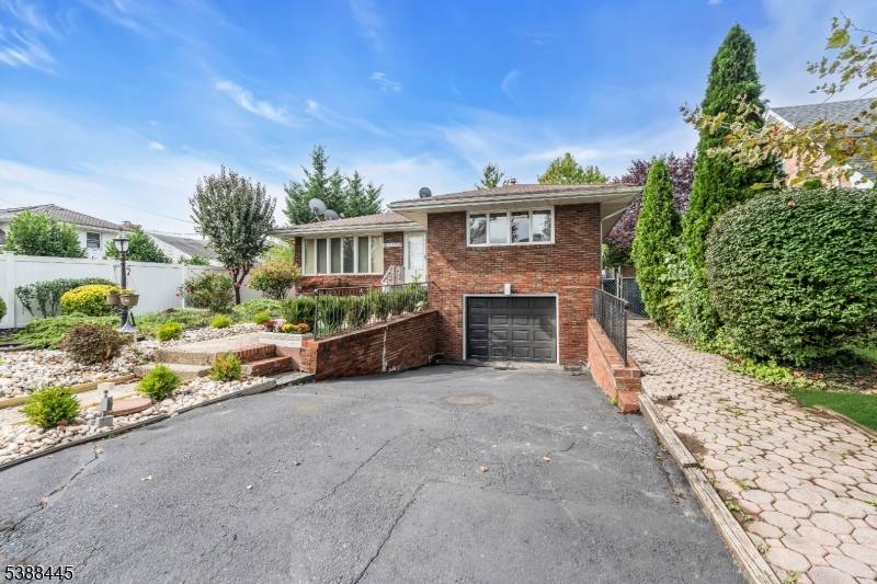 Welcome to your new beginning in this beautifully updated three bedroom, two and a half bathroom home in the heart of Woodbridge.