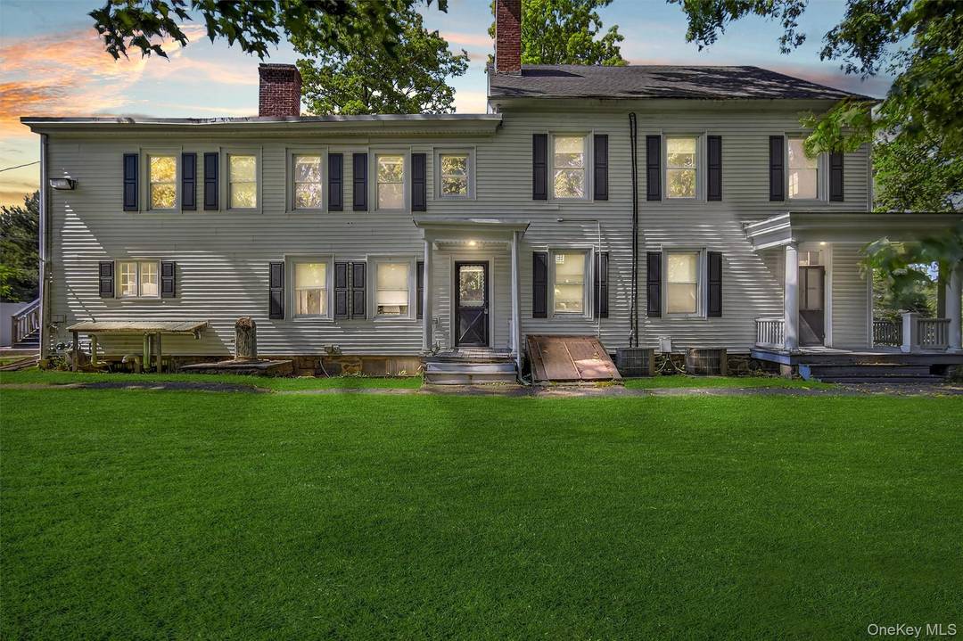 Nestled in the heart of Cornwall, NY, this stately colonial sits on 1.