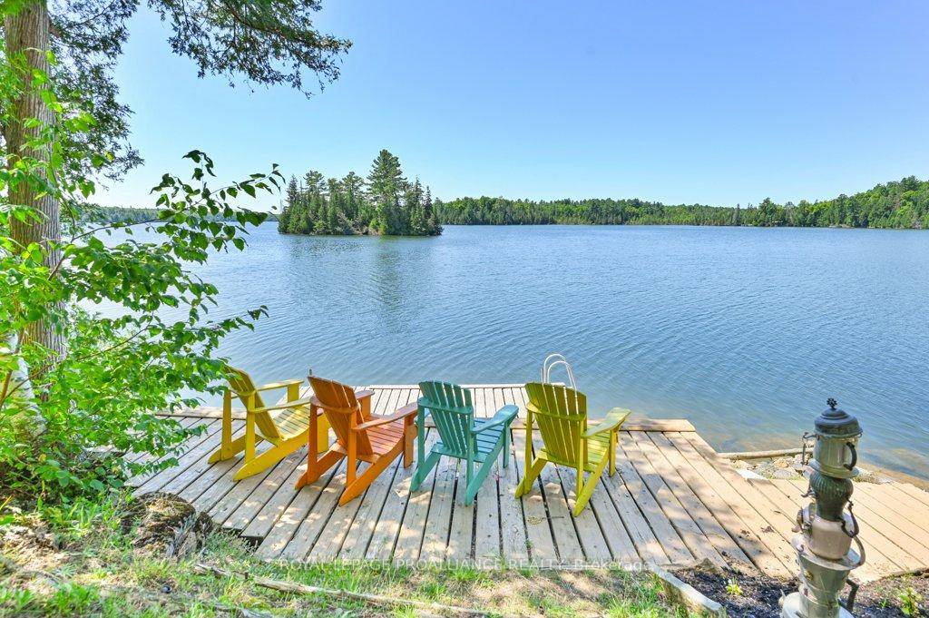 A rare opportunity on Malcolm Lake is available with 370 feet of pristine waterfront and breathtaking sunset views.