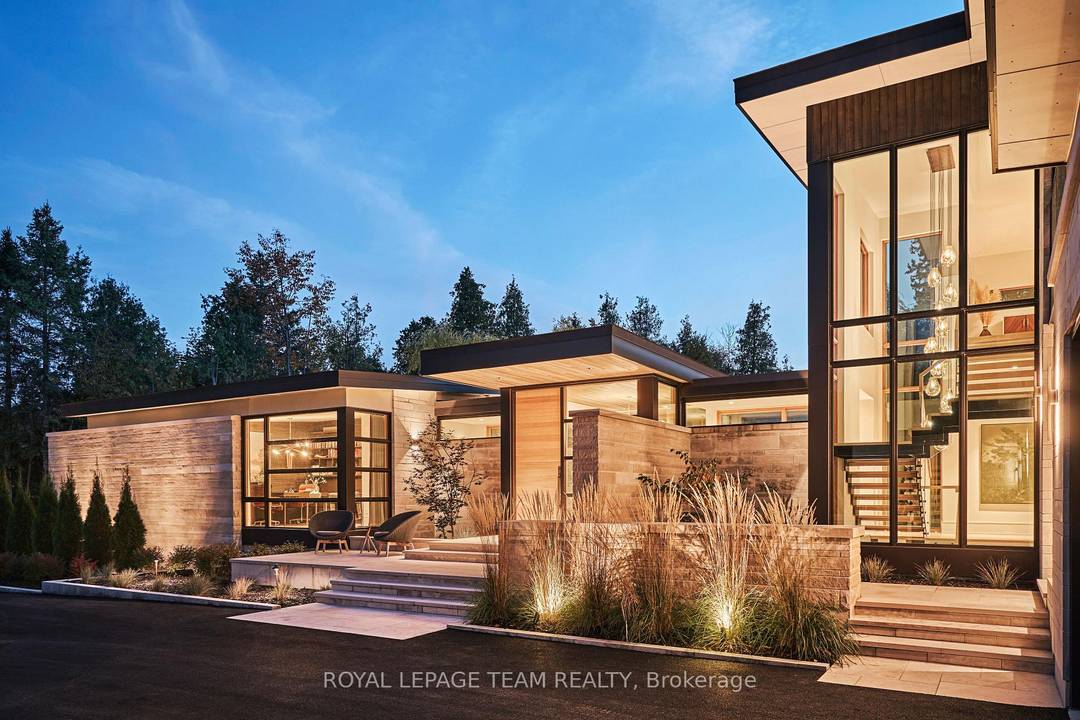 Discover a rare opportunity to own an architectural dream in the Kanata Rockeries.