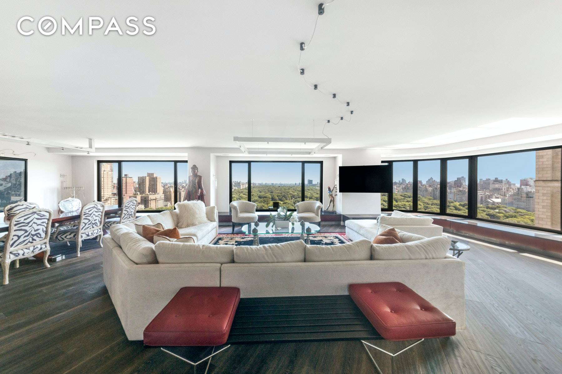 A gracious, private entry with double doors opens to an impressive foyer with Central Park at your feet.