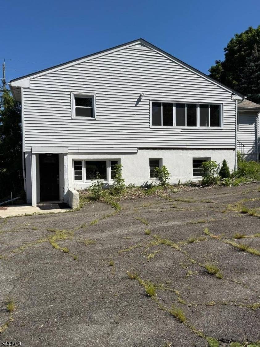 This property has a walk out lower basement with an office and bathroom.