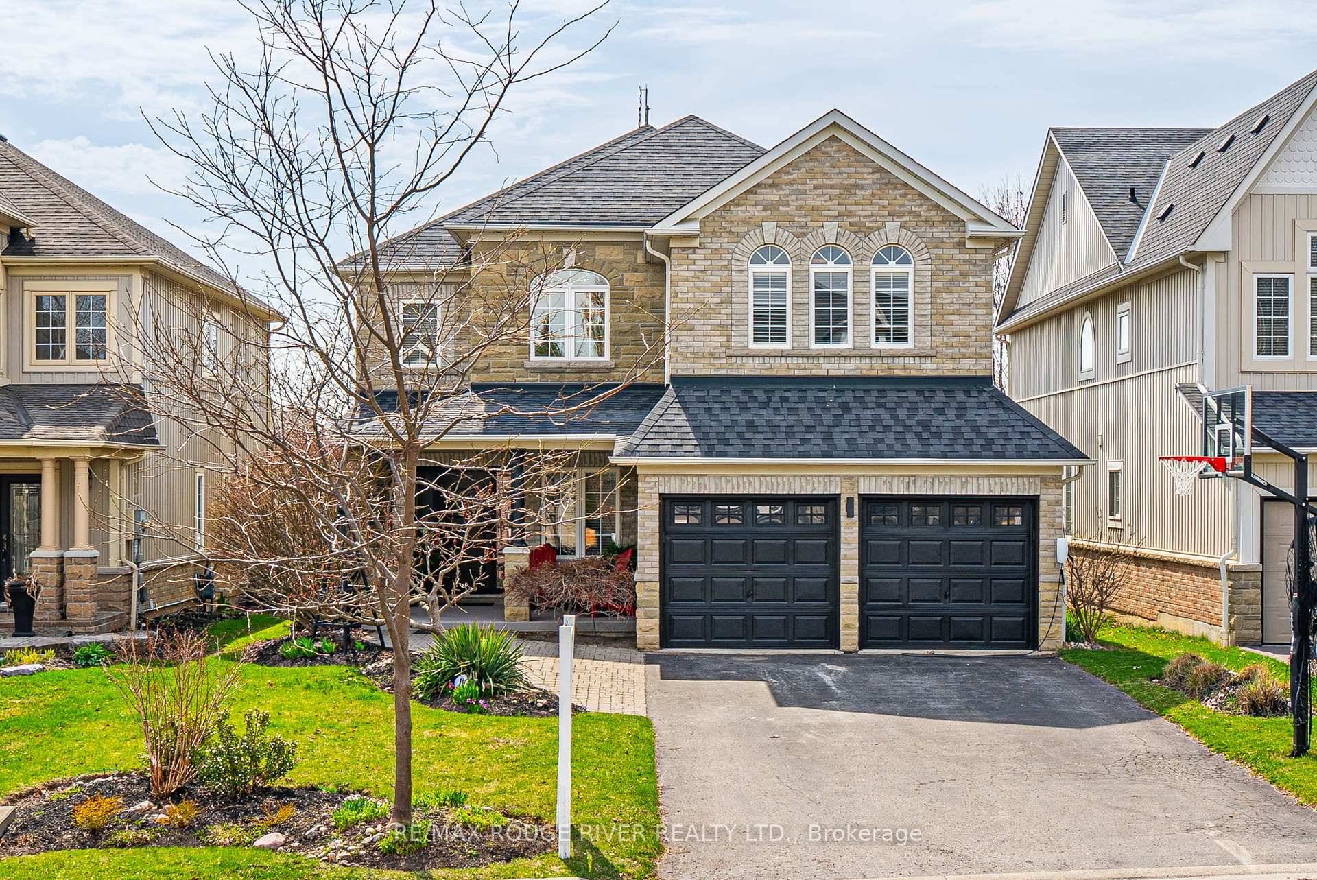 Welcome to this absolutely stunning executive home offering 4 2 bedrooms and exquisite high end finishes throughout, ideally located with no rear neighbours and breathtaking ravine views.