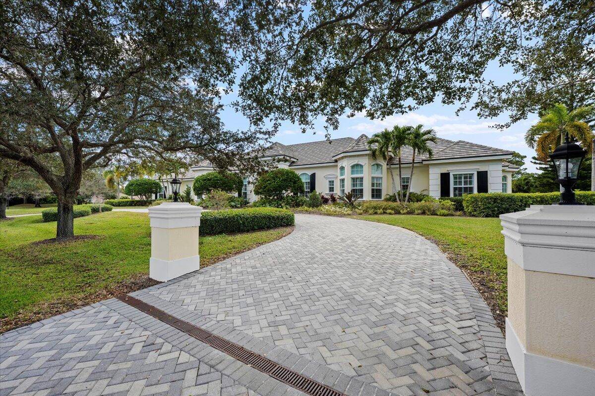 Welcome to 5775 Lady Luck Road, an exquisite property located in the tranquil Steeplechase community.