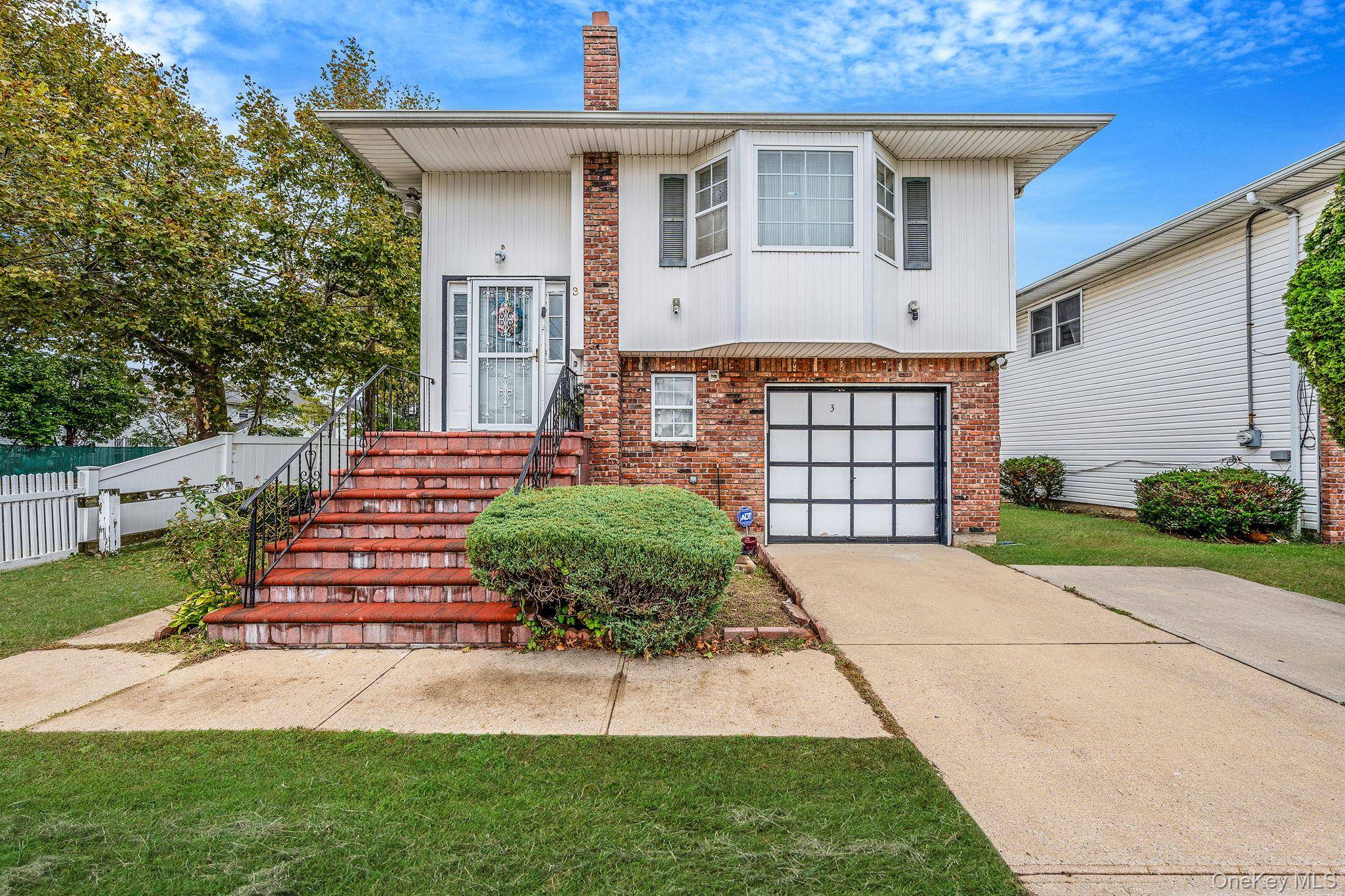 Welcome to 3 Tompkins Place, nestled in the vibrant community of Hempstead !