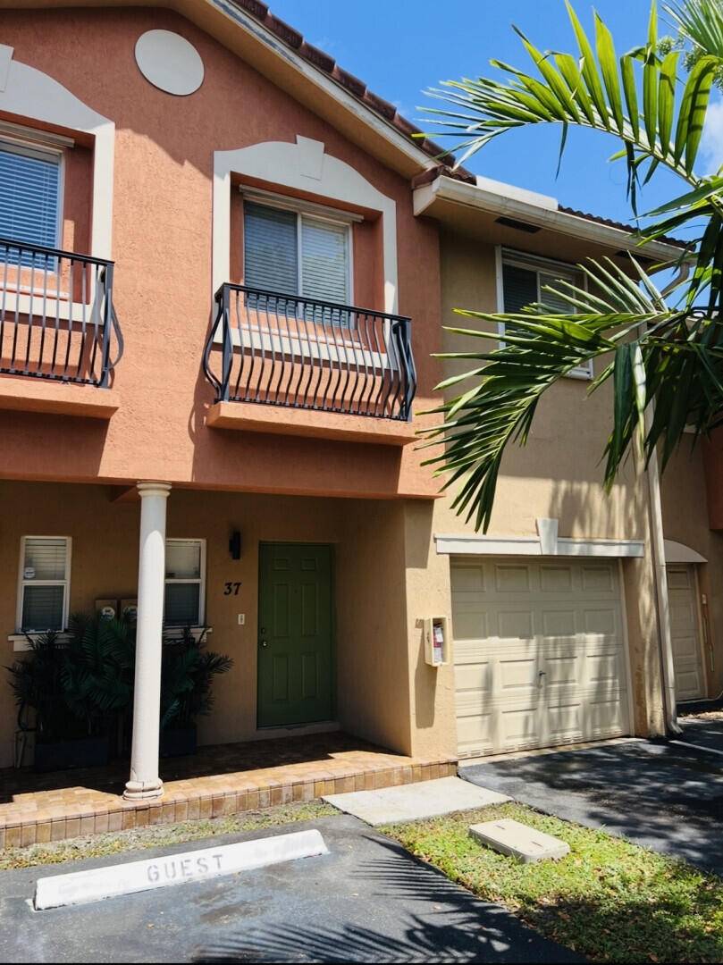 This modern townhouse located at 37 Southeast 3rd Avenue in Hallandale Beach, FL was built in 2007.
