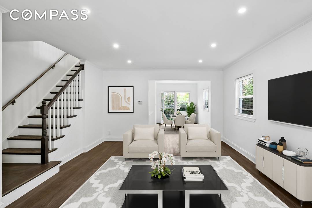 Welcome to this meticulously renovated single family townhouse located at 89 36 Springfield Blvd in vibrant Queens, NY.