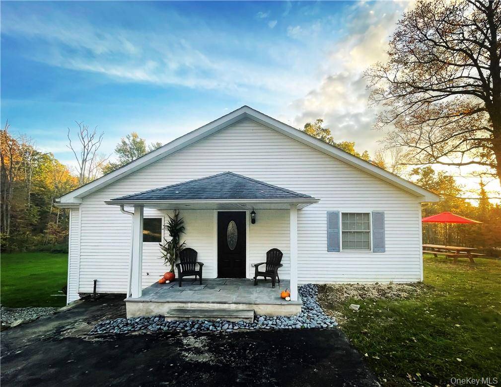 Discover two beautifully maintained homes on one expansive 3.