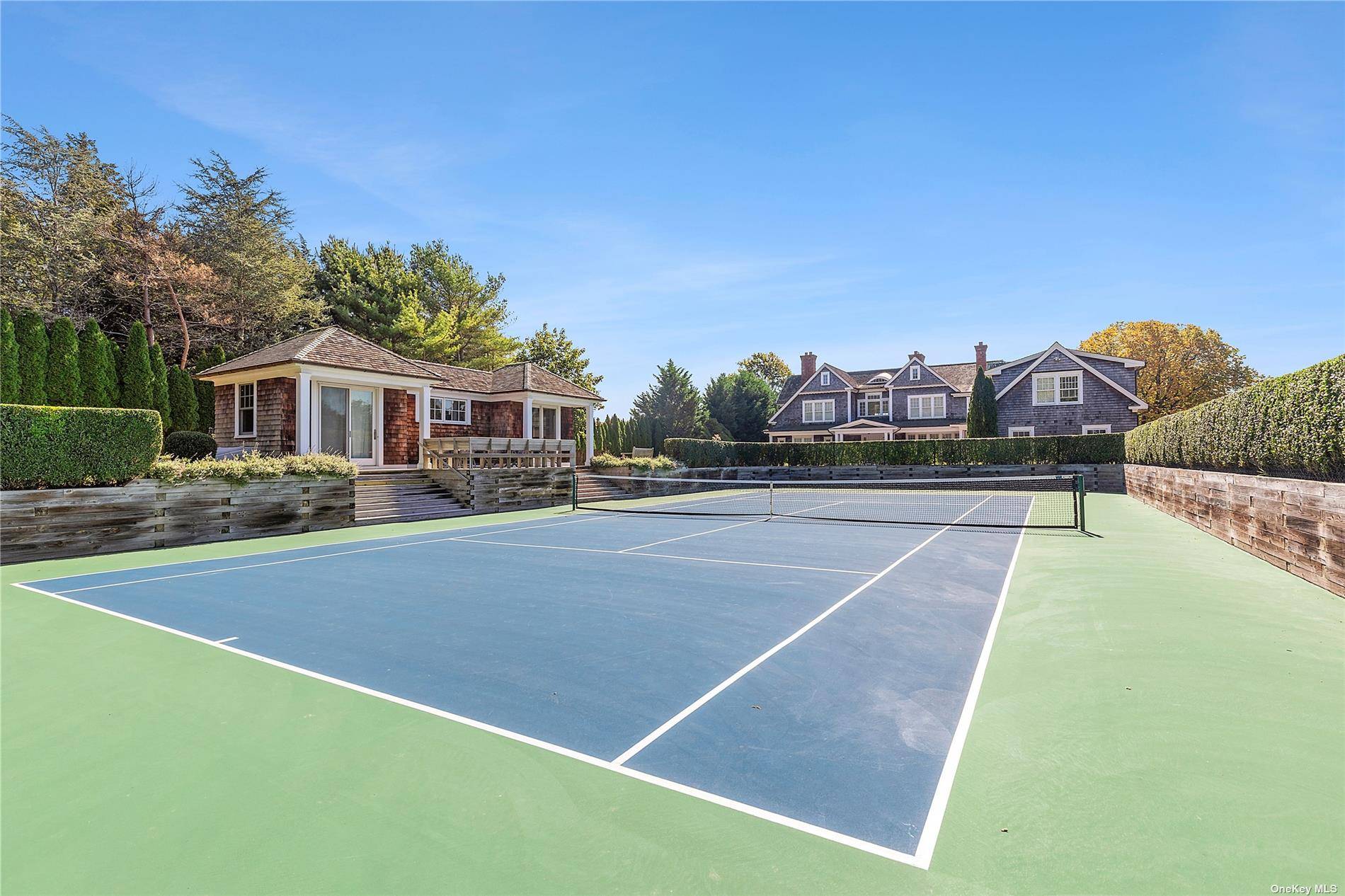 WATER MILL SOUTH OF THE HIGHWAY WITH TENNIS Welcome to your dream home in Water Mill !