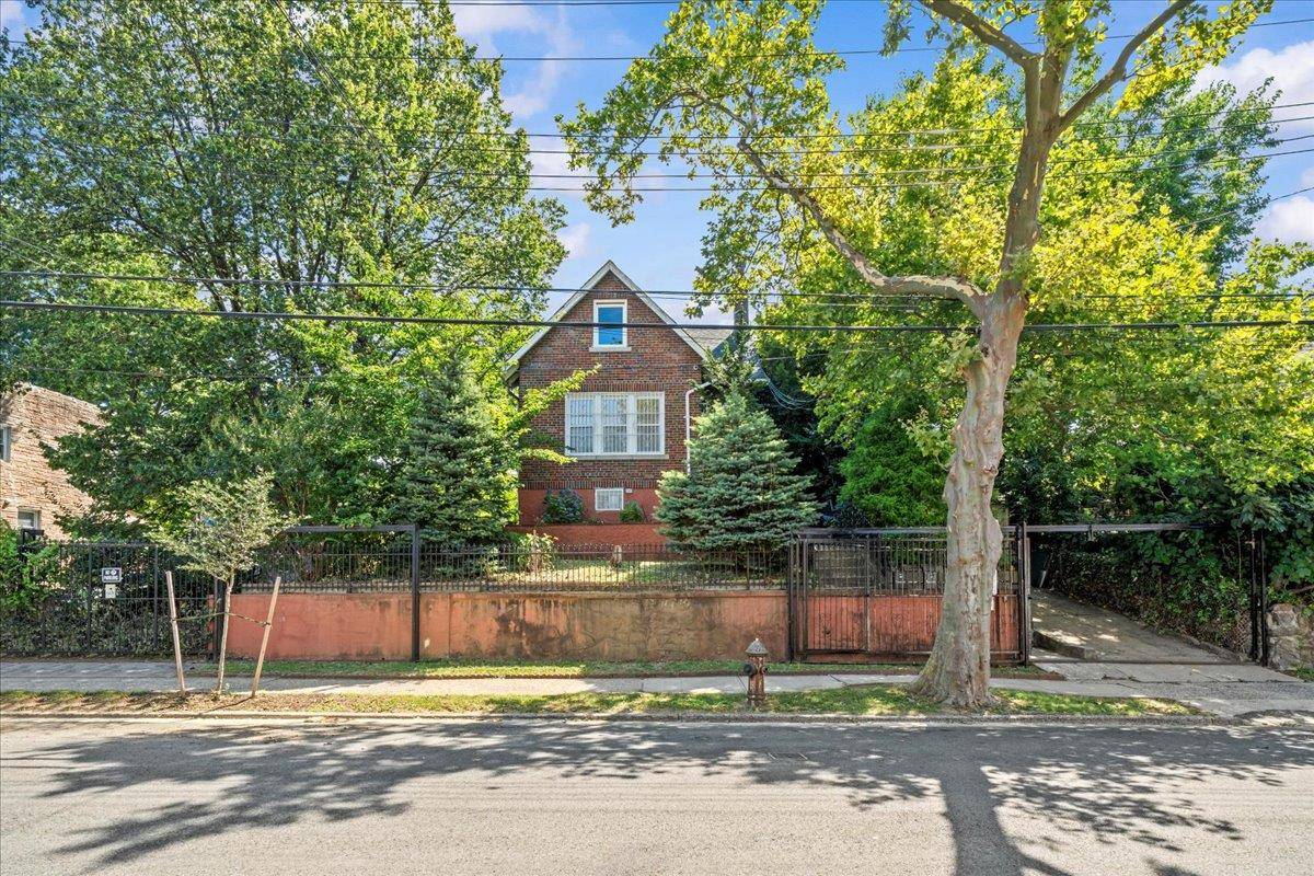 Step into this charming two family house, with a fully finished basement, nestled on an oversized lot.