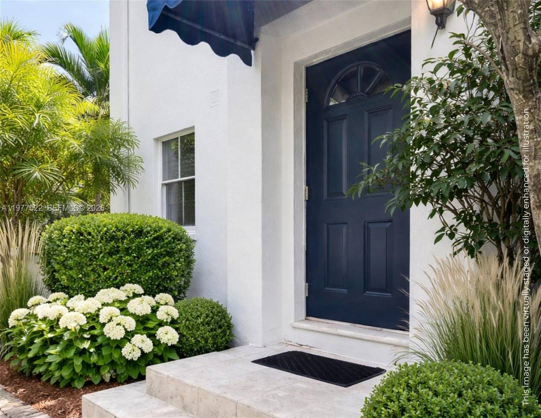 Experience the best of Coconut Grove living from this ideally located townhome in the lush, boutique enclave of French Village.
