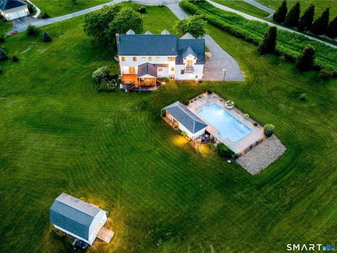 Set on 2. 51 picturesque acres, this elegant Colonial offers over 3, 090 square feet of thoughtfully designed living space with 5 bedrooms, 3 full baths, and 1 half bath.