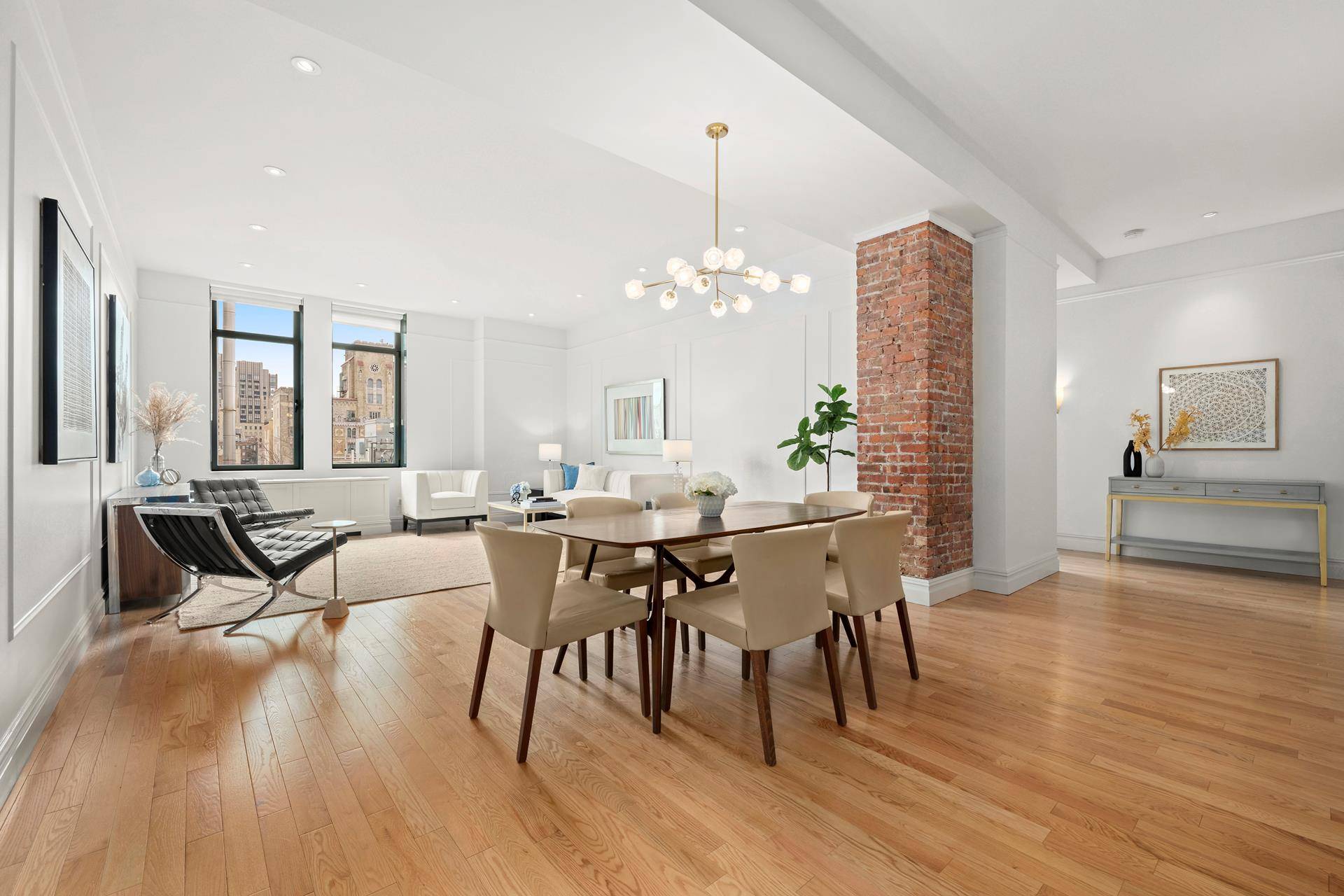 Welcome to this extraordinary residence at The Chelsea Mercantile, featuring soaring ceiling heights and unobstructed southern exposure that floods the space with natural light.