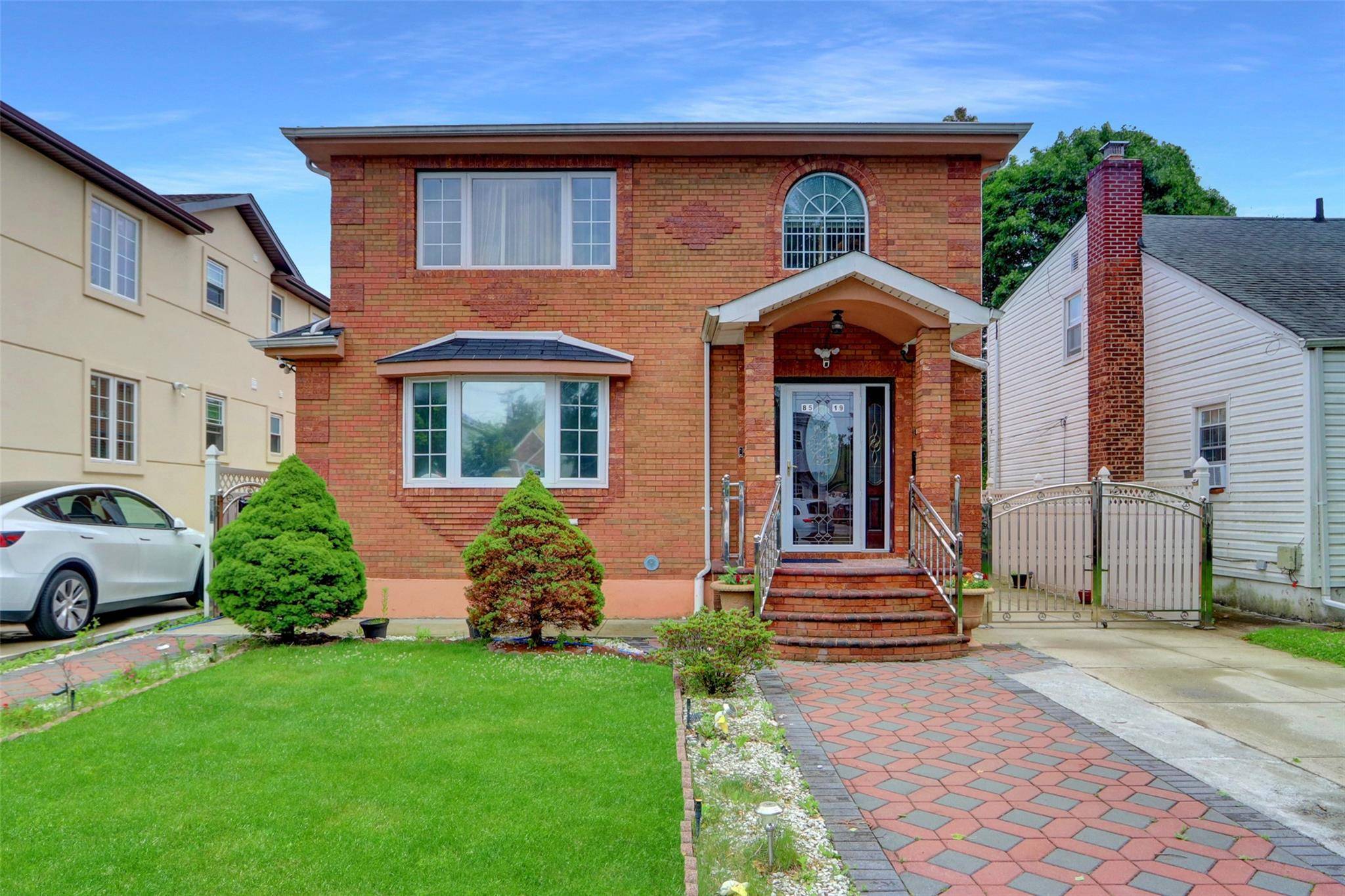 Beautiful well maintained 2 family brick home.
