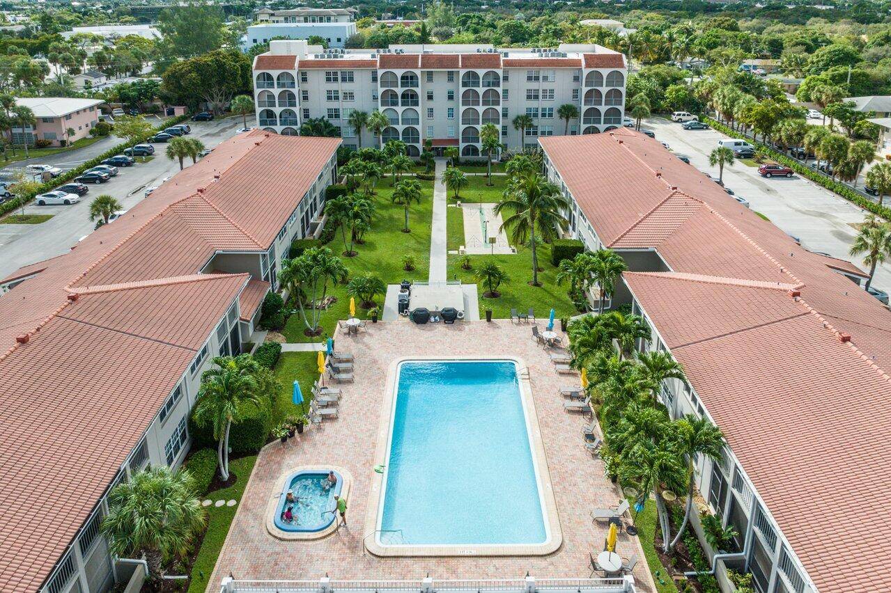 WELL PRICED EAST BOCA 2 BED 2 BATH CORNER UNIT IN 55 COMMUNITY.