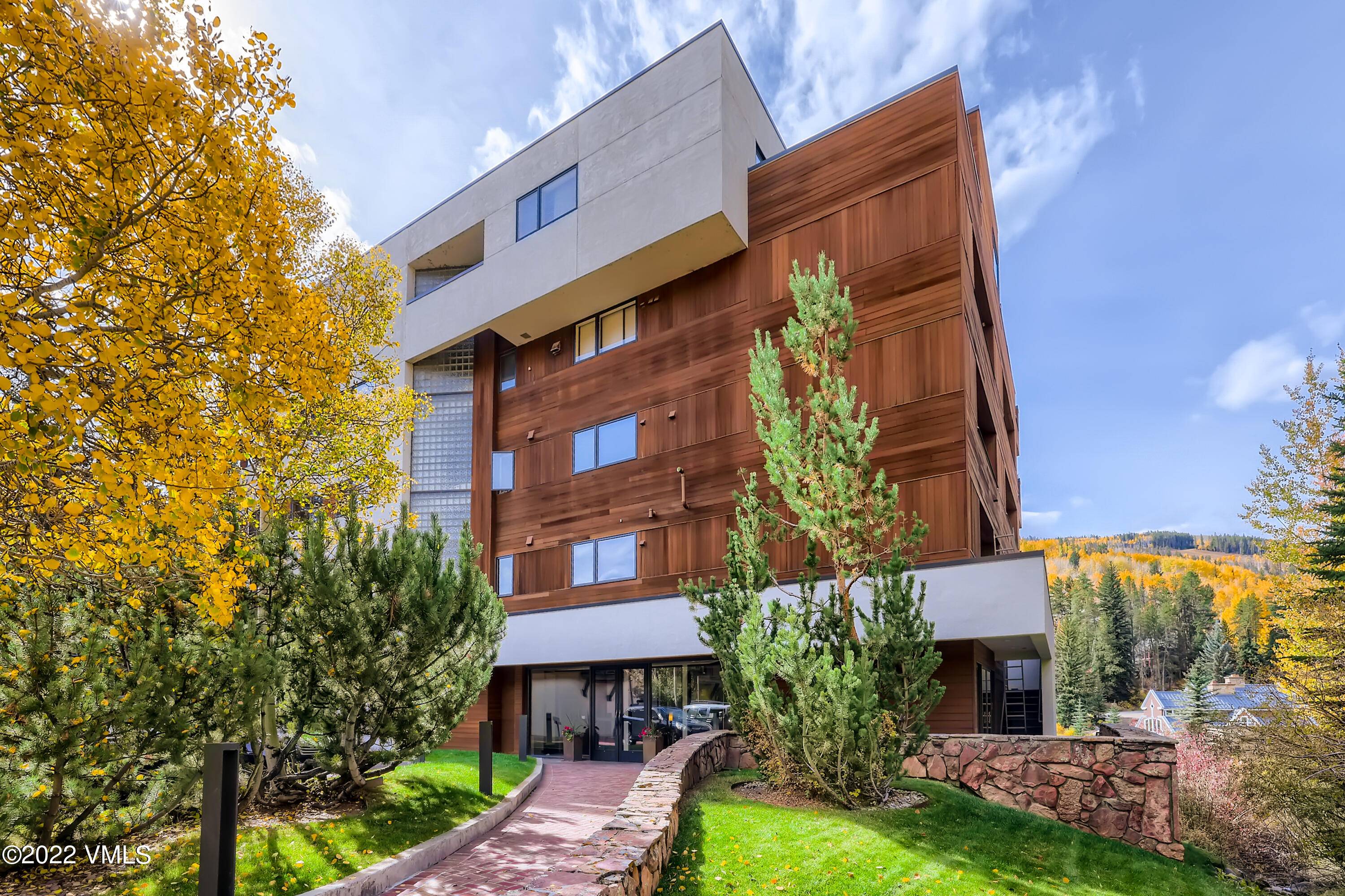 Located along Gore Creek with floor to ceiling windows facing Vail Mountain.
