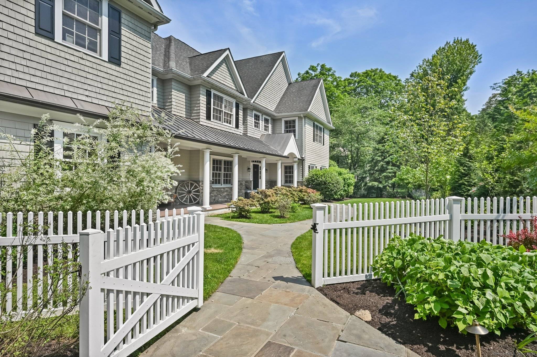 A rare opportunity to own a truly turn key, updated Colonial in one of the most charming coveted neighborhoods in New Canaan.