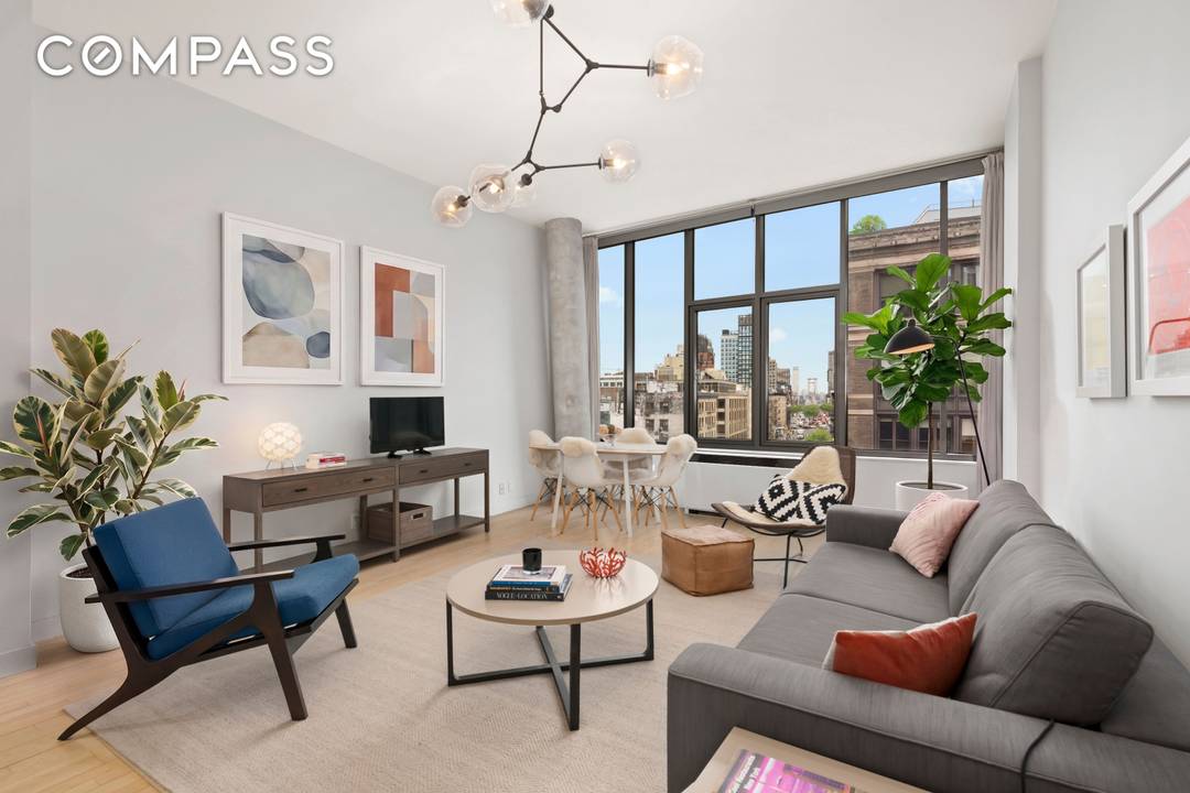 Start each day watching the sun rise over the Williamsburg Bridge from your spacious living room.
