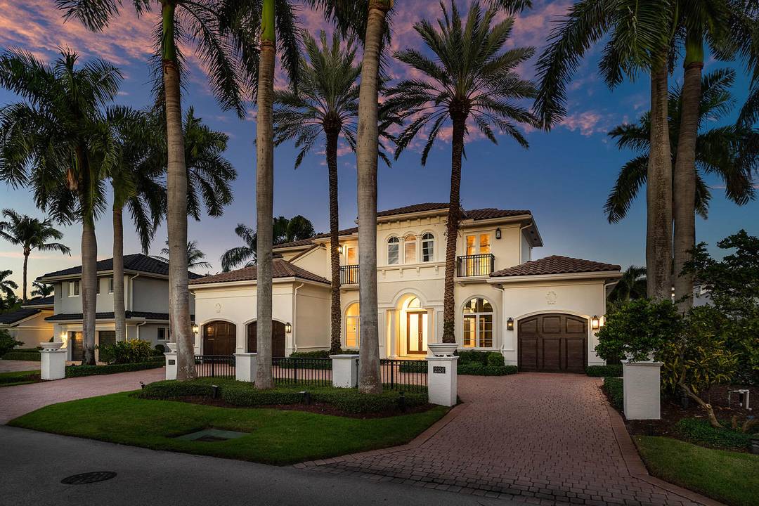 Welcome to 2124 West Maya Palm Drive, a beautifully renovated transitional estate in Boca Raton's Royal Palm Yacht Country Club.